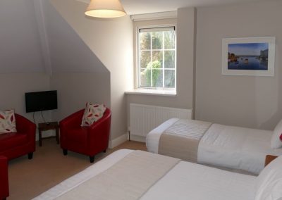 Room showing double and single bed