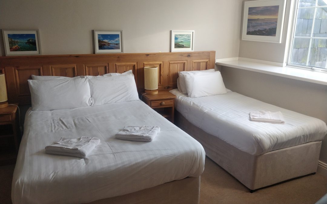Double/twin room showing double and single beds