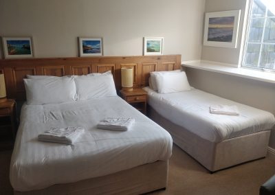 Double/twin room showing double and single beds